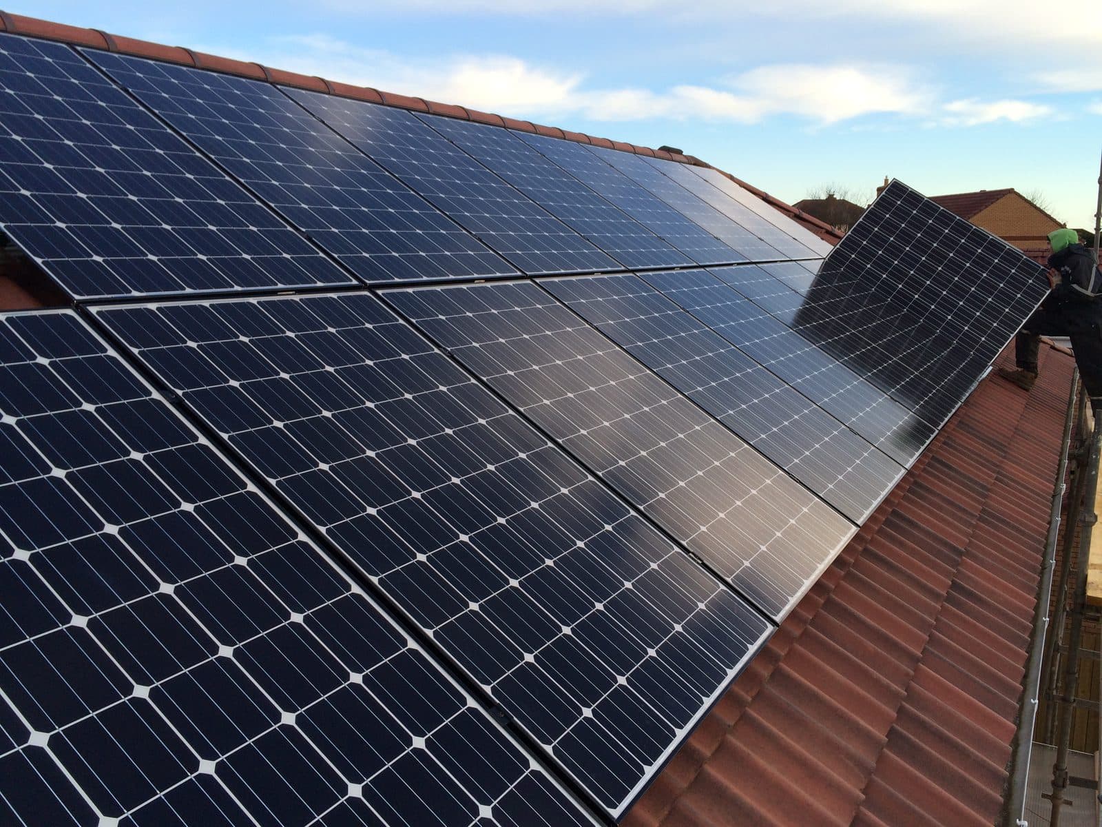 Solar panels on a tiled roof installed by GMC