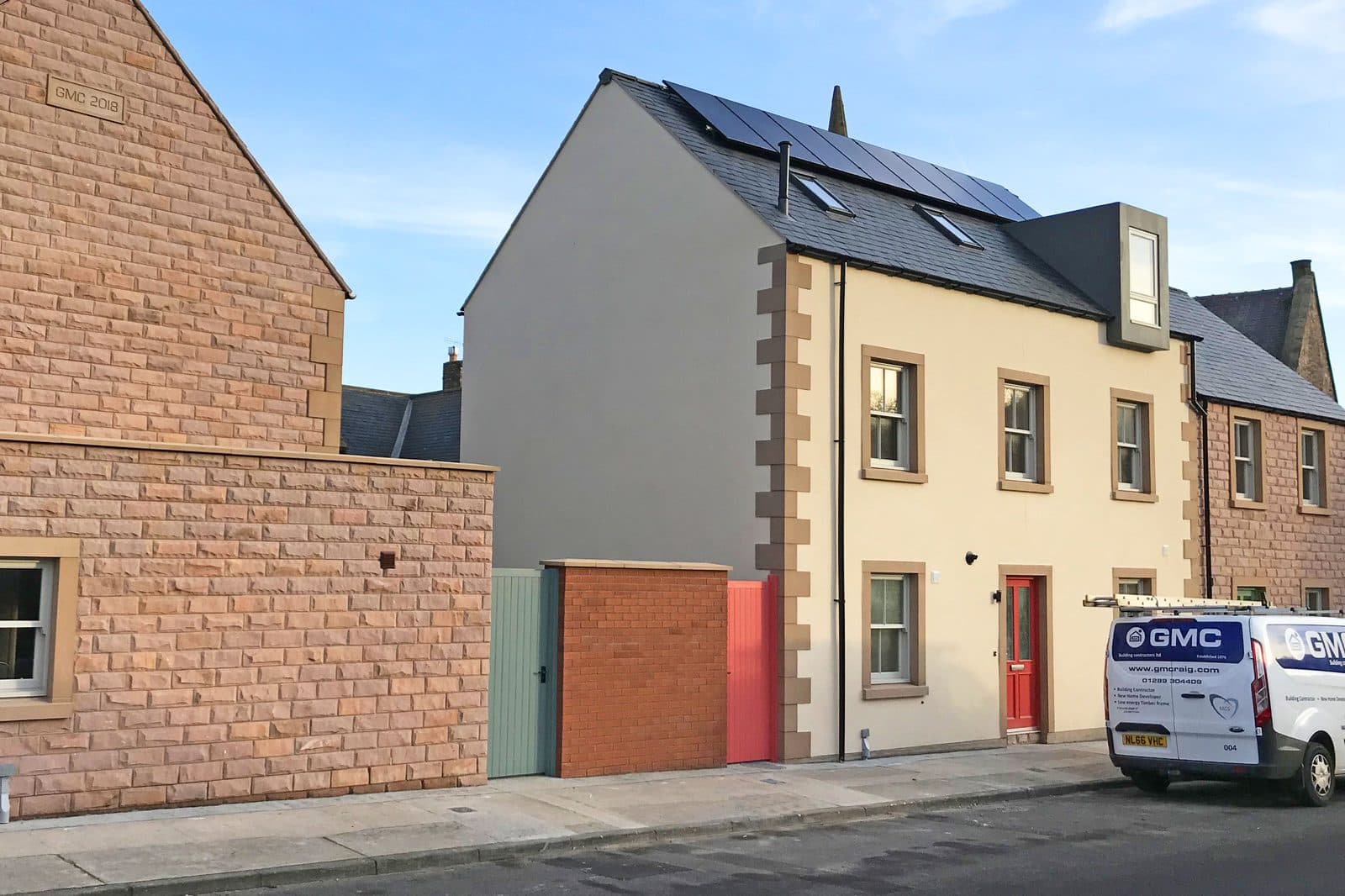 Solar panels on a townhouse roof installed by GMC